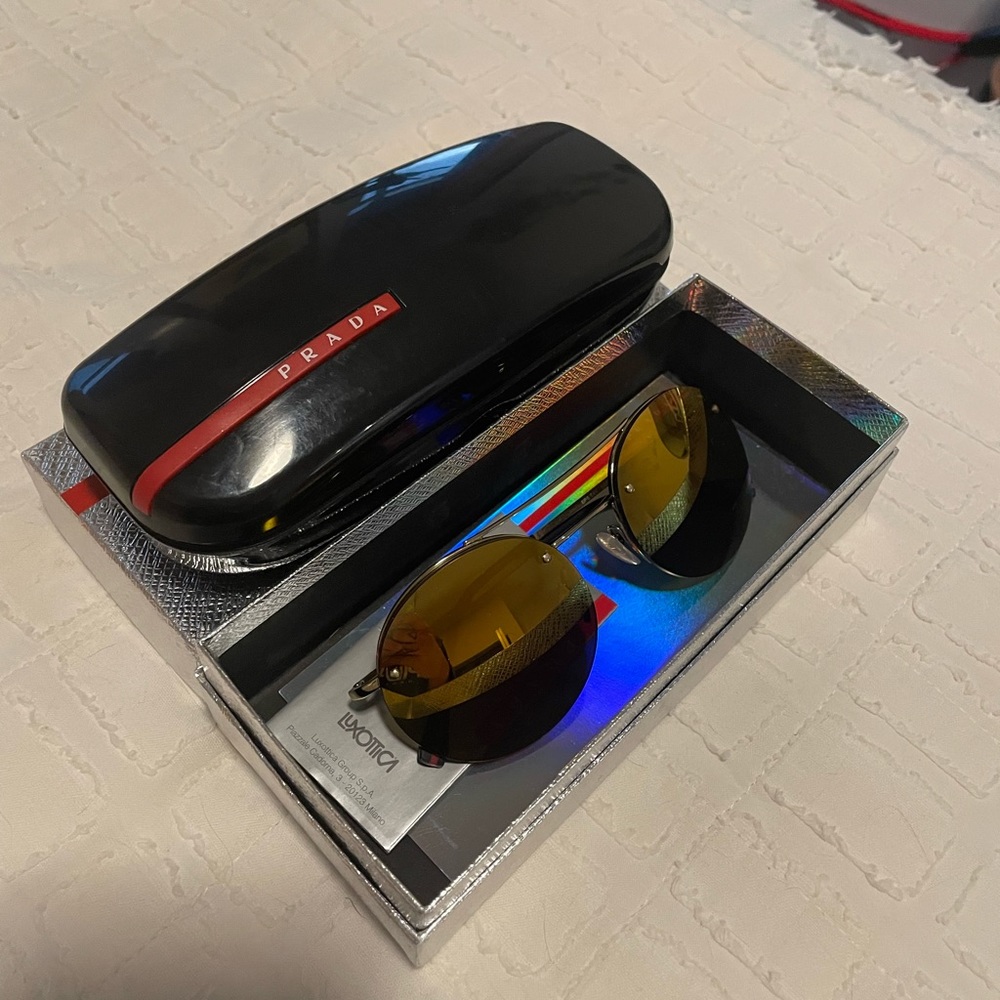 Prada linea rossa gold lens aviators